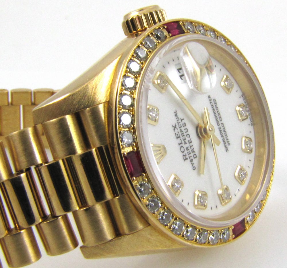 Rolex 69068 Ladies President with Serti Dial and W serial from 1995-1996.