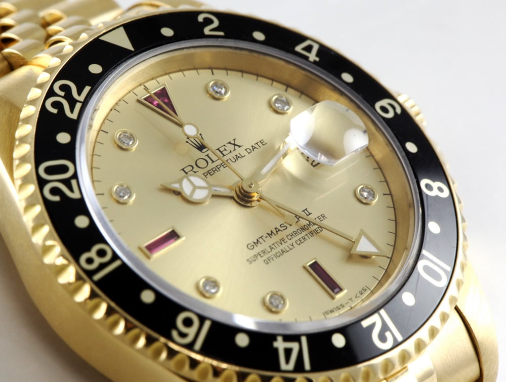 Rolex GMT-Master II with Ruby Serti dial. Ref. 16718, E serial, ca. 1991.