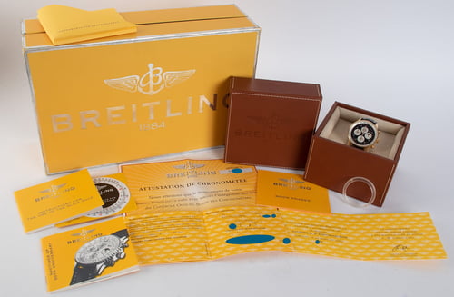 Box / Paper shot of Navitimer Quantieme Perpetual 50th Anniversary