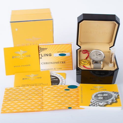 Box / Paper shot of Navitimer Olympus