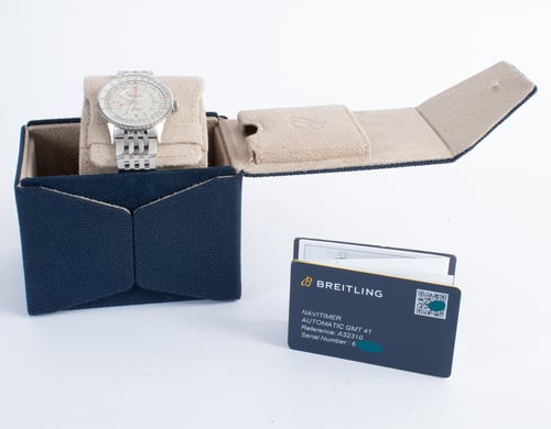 Box / Paper shot of Navitimer Auto GMT 41
