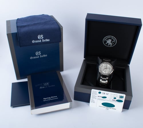 Box / Paper shot of Sport Spring Drive GMT Evolution 9 'Mistflake'