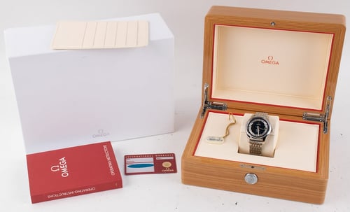 Box / Paper shot of De Ville Hour Vision