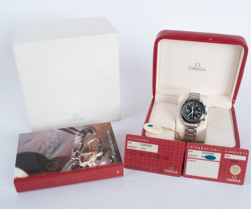 Box / Paper shot of Speedmaster Day-Date