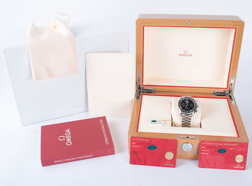 Box / Paper shot of Speedmaster 38