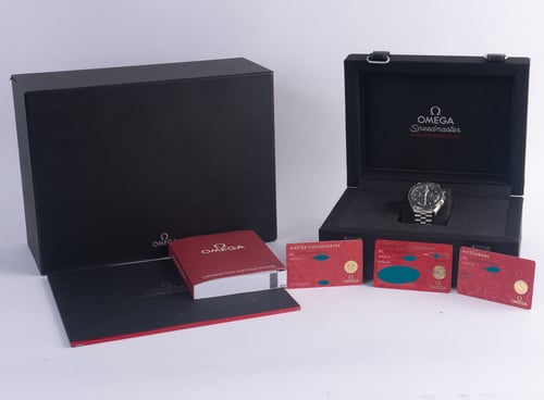 Box / Paper shot of Speedmaster Moonwatch Professional Co-Axial Master Chronometer