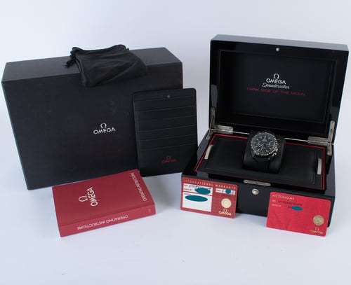 Box / Paper shot of Speedmaster Dark Side of the Moon 'Pitch Black'