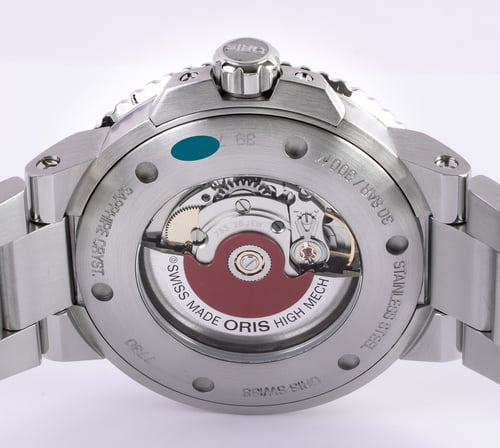 Caseback of Aquis Date Cherry Edition