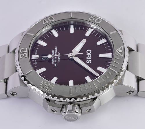 Crown Side Shot of Aquis Date Cherry Edition