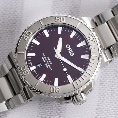 Stylied photo of  of Aquis Date Cherry Edition