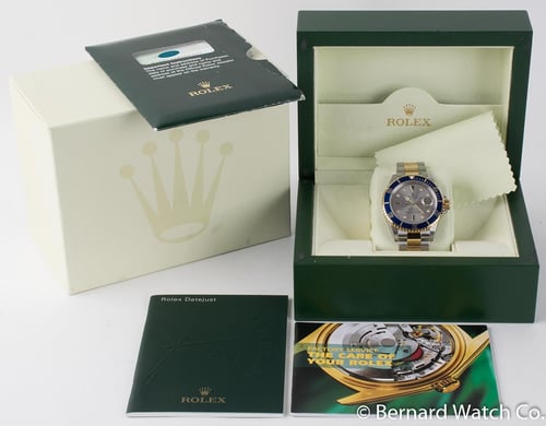 Box / Paper shot of Submariner Date 'Serti'