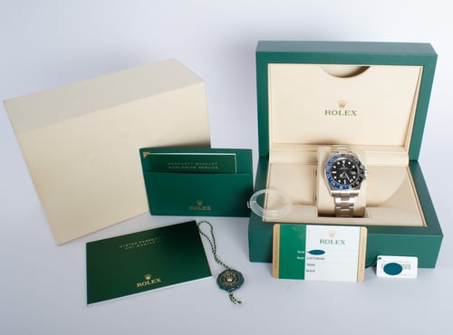 Box / Paper shot of GMT-Master II BLNR 'Batman'