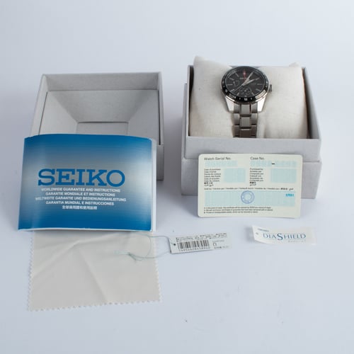 Box / Paper shot of Presage GMT Sharp Edged SPB221