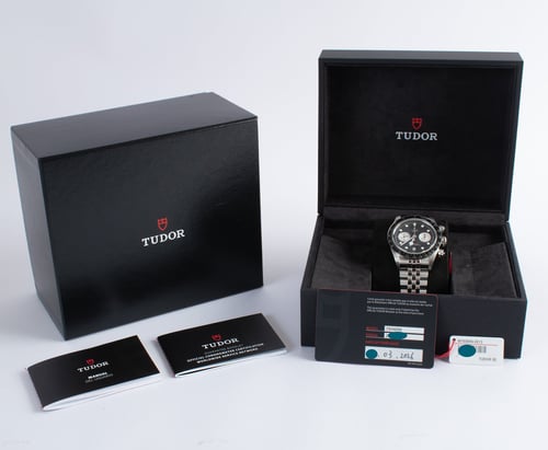 Box / Paper shot of Black Bay Chronograph