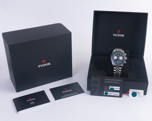 Box / Paper shot of Black Bay Blue Chronograph