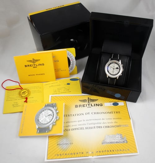 Box / Paper shot of Navitimer Montbrillant Olympus