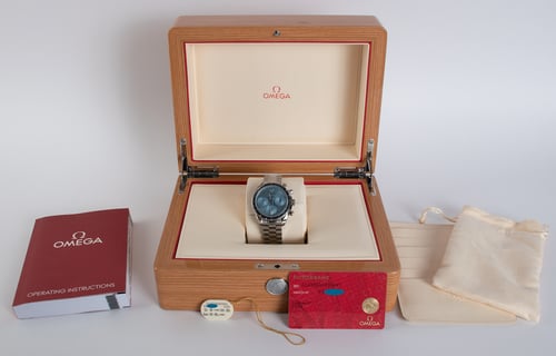 Box / Paper shot of Speedmaster 38