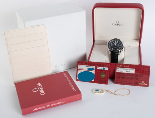 Box / Paper shot of Speedmaster Moonwatch Co-Axial Chronograph