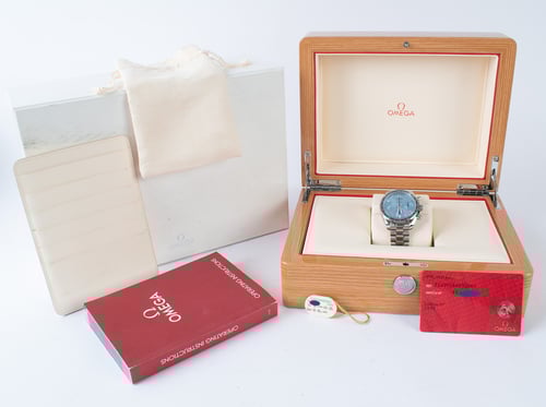 Box / Paper shot of Speedmaster 38