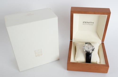 Box / Paper shot of Chronomaster El Primero Triple Date Moon